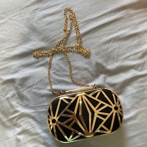 Super cute mini black & gold clutch
